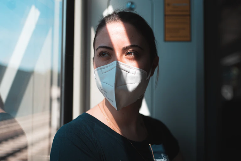 Nurse looks out the window