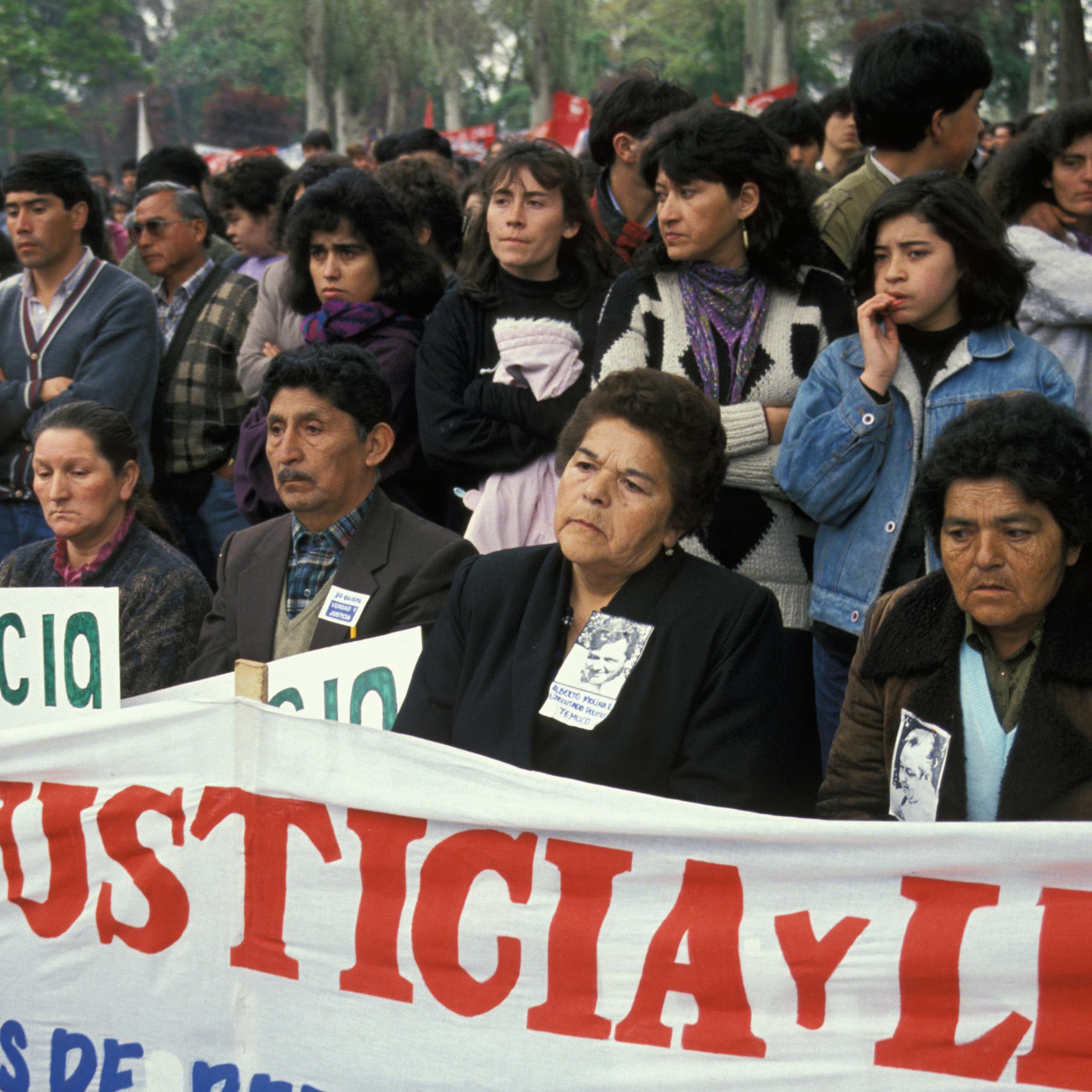 Rows of men, women and children protesting in Santiago, Chile