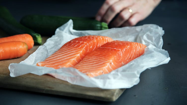 Raw salmon in paper