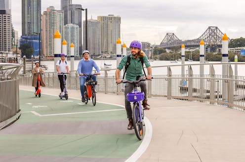 Five years on, Brisbane's e-scooters and e-bikes are winning over tourists and residents as they open up the city