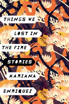 An illustration of abstract leaves on the book cover for Things We Lost in the Fire.