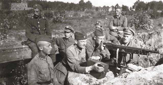 Polish troops man a machine gun in trenches during the Soviet-Polish war of 1919-20.