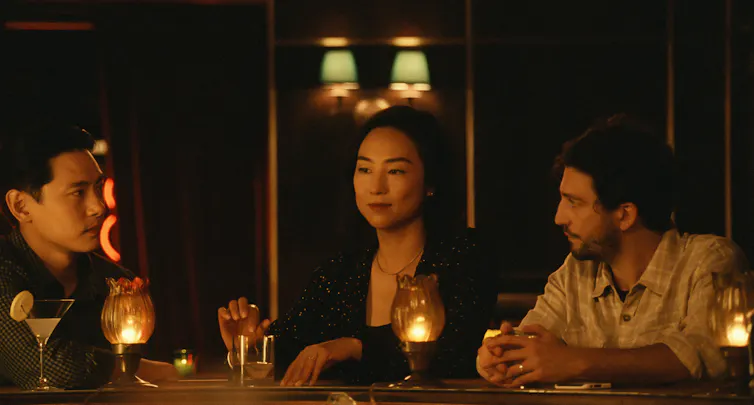 Hae-Sung, Nora and her husband Arthur sat at a bar