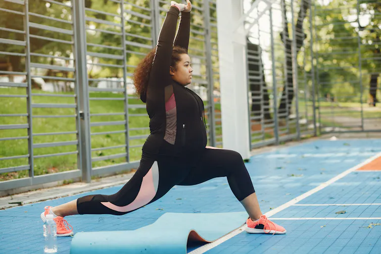 Woman doing exercise and stretches.