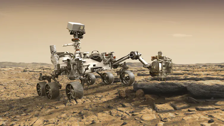 An artist's rendition of the Perseverence rover, make of metal with six small wheels, a camera and a robotic arm.