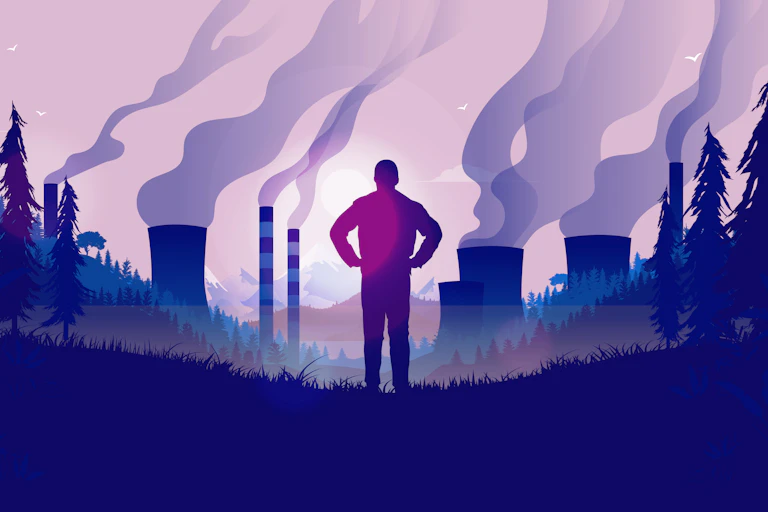 Silhouette d'un homme regardant des usines.