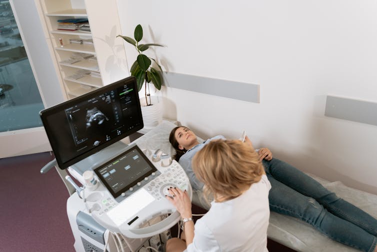 Woman having an ultrasound scan.
