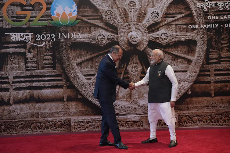 Indian prime minister, Narendra Modi, shakes hands with Russian foreign minister, Sergey Lavrov