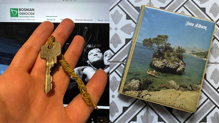 A hand holds a key and a photo album with an island on the cover.