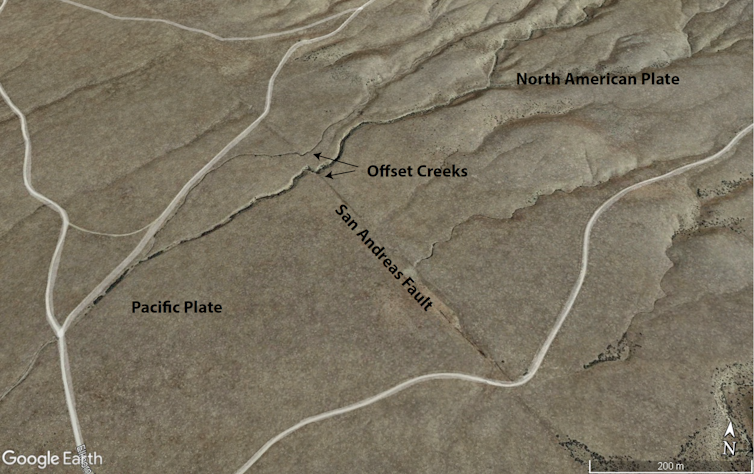 A map shows two creeks with abrupt shifts in their location over the fault.