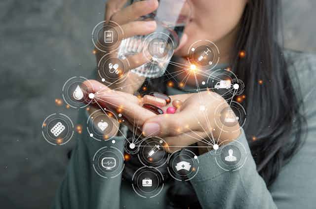 Woman drinking from glass of water and holding a palmful of pills, overlayed with symbols and icons