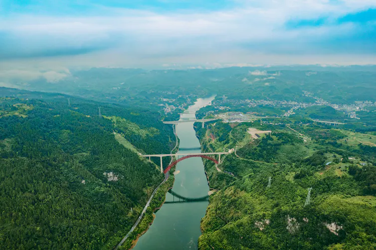 A drone shot of two bridges over a gorge.
