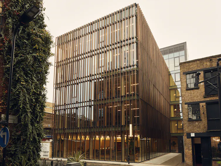 A high-rise building with a timber façade.