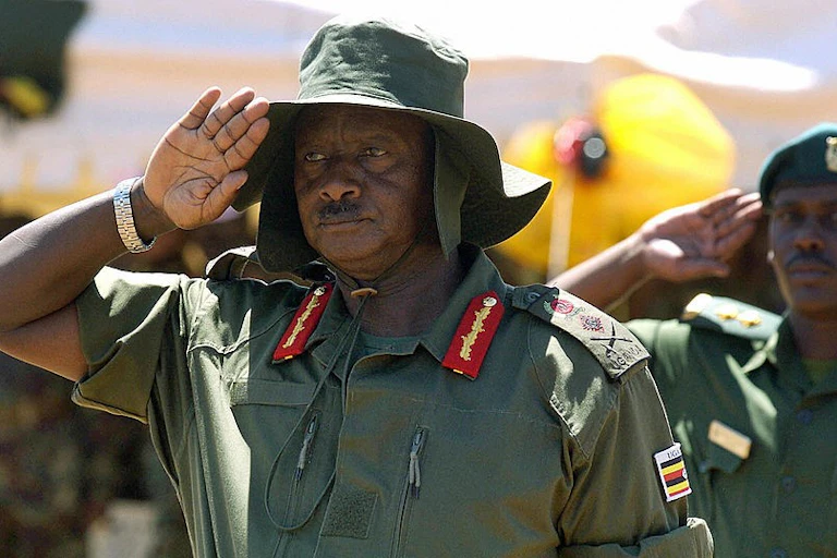A man in military uniform gives a salute