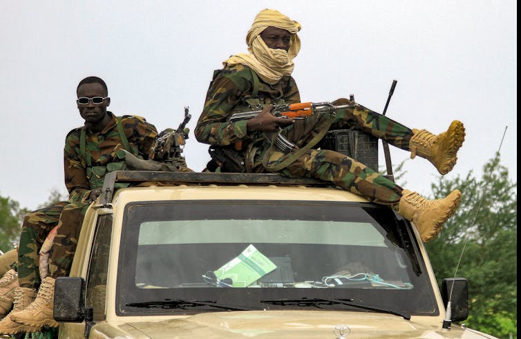 A military convoy on the way to Port Sudan on Aug. 30, 2023. Photo by AFP via Getty Images