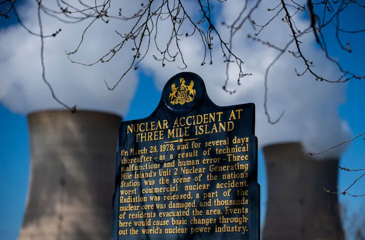 A memorial plaque near the nuclear plant on Three Mile Island.