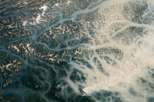 Astronauts aboard the International Space Station captured the detailed photograph, which shows smoke in valleys in British Columbia near the towns of Golden and Revelstoke. Captured on August 16, 2023