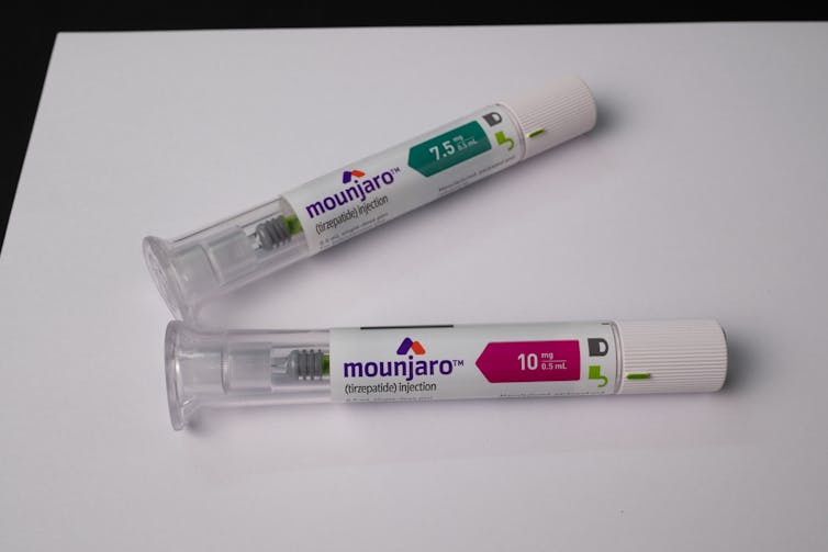 Two vials of mounjaro injectables.