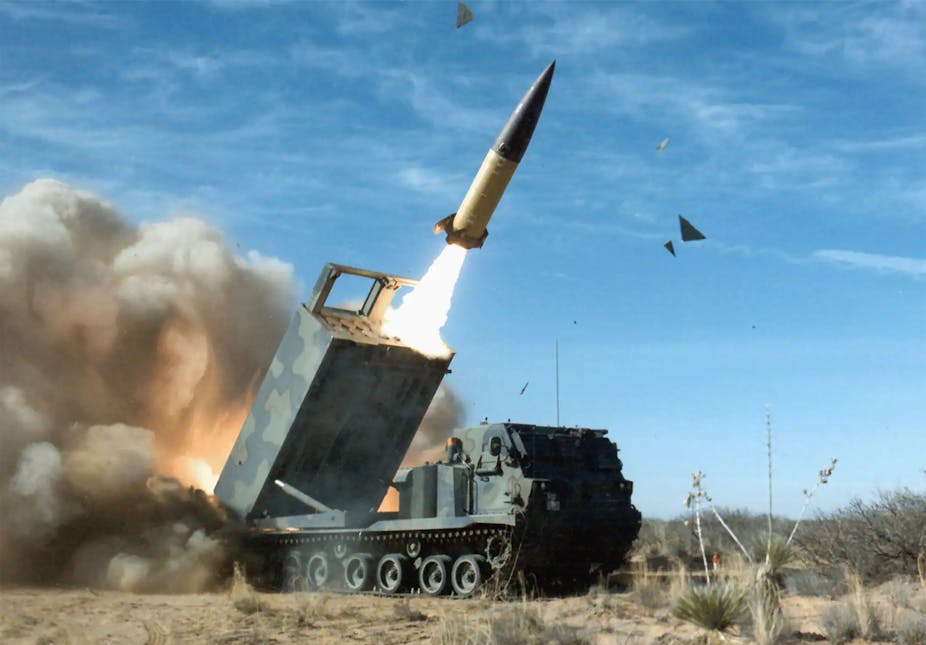 ATACMS - army tactical missiles - being fired from an M270 multiple launch rocket system. 