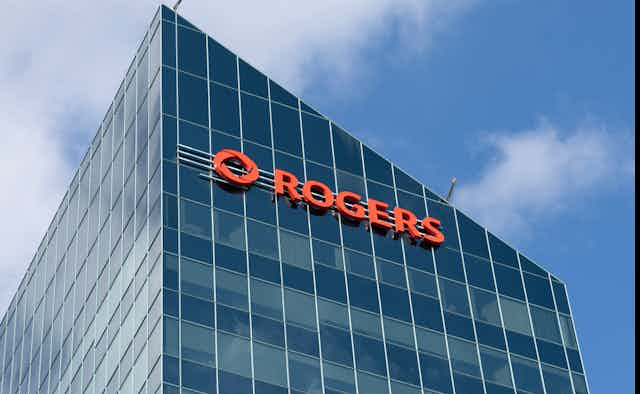 A tall building with the Rogers logo on the front
