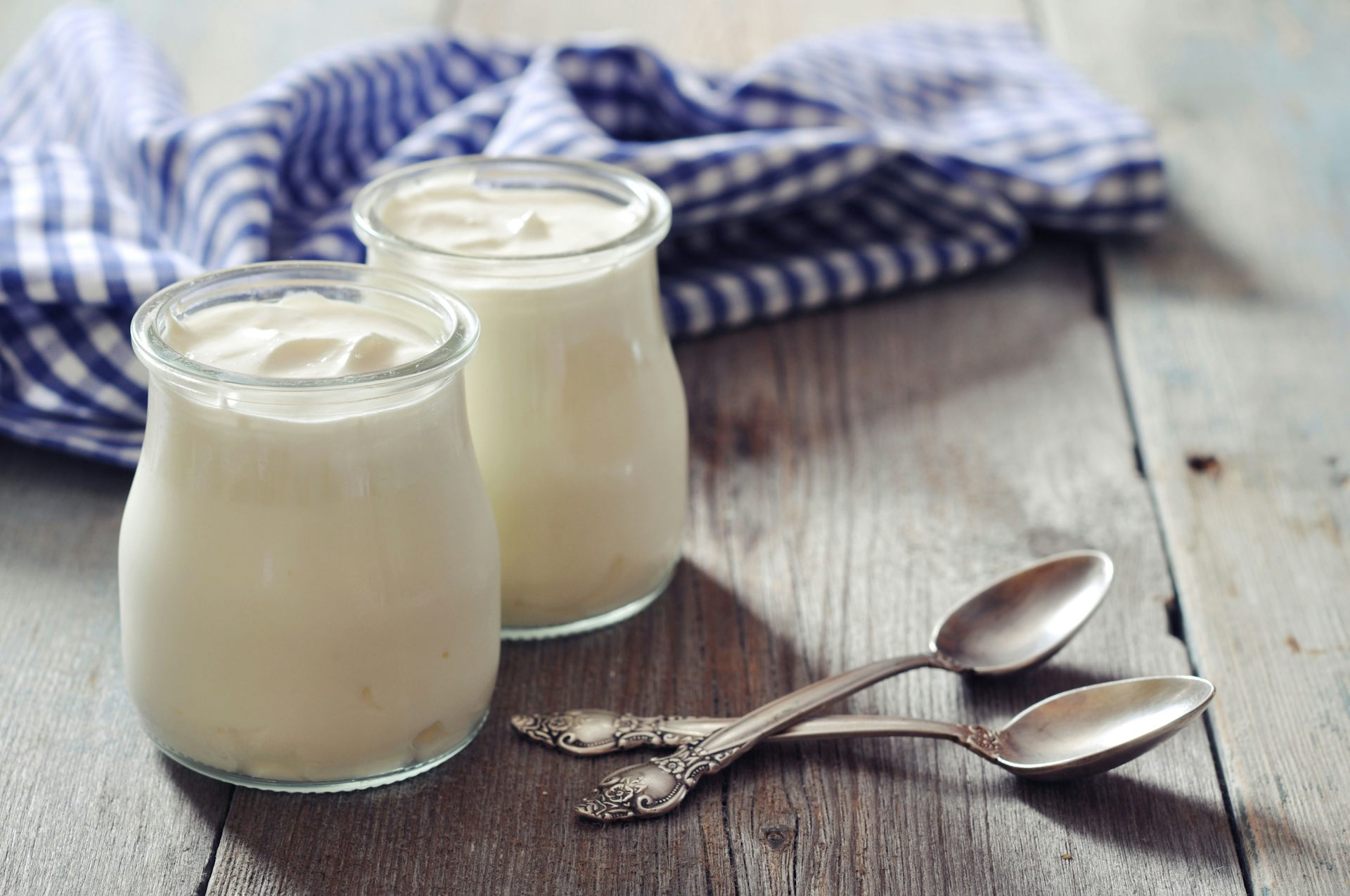 Two pots of Greek yoghurt