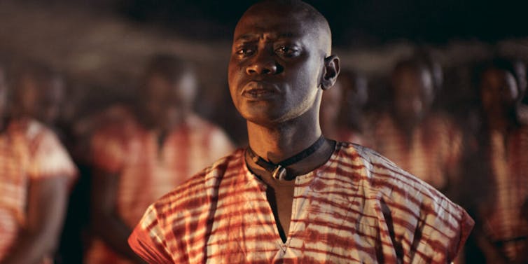 A man acting in a movie