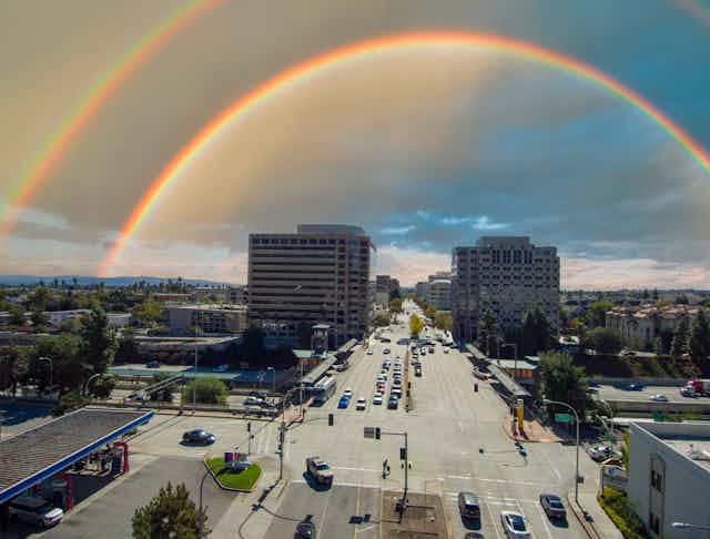 Aerial photo of Pasadena, California, under the arc of a double rainbow 
