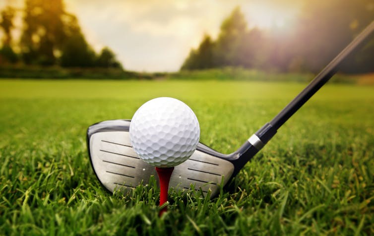 Golf ball and club.
