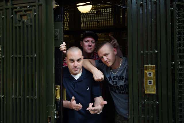 The Hilltop Hoods are in a lift.