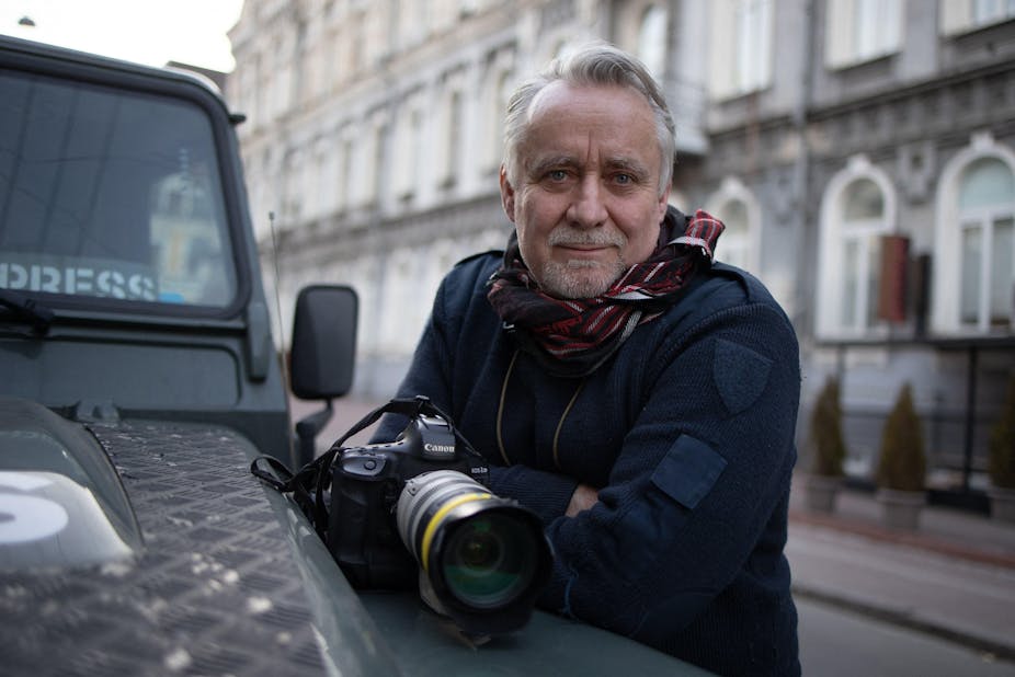 Photojournalist Guillaume Briquet with one of his cameras in Kyiv 2022.