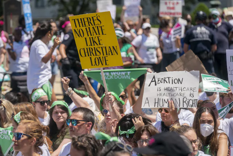 Pro-choice US women protest against supreme court decision to overturn Roe v Wade.
