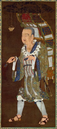 A detail from a Chinese scroll painting of a man with short hair in a green robe and sandals.