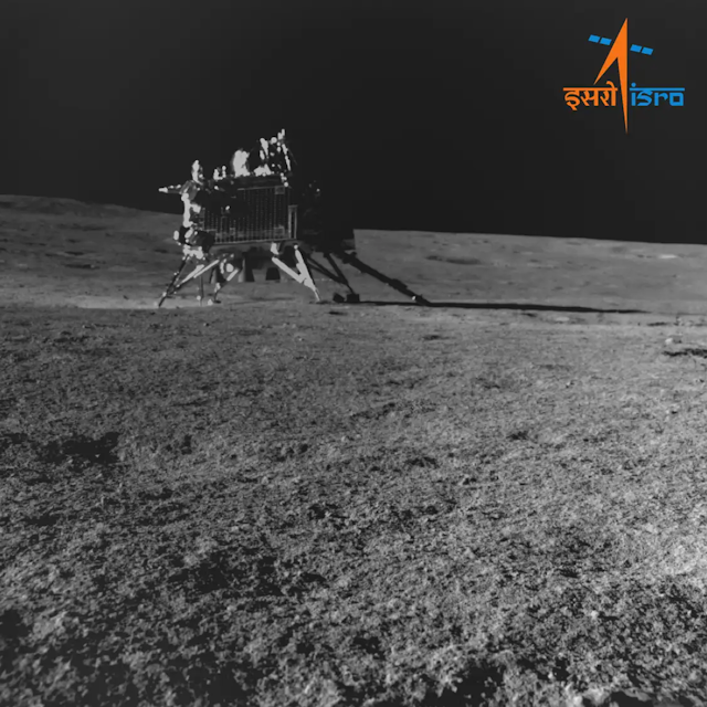 Chandrayaan-3 sits on the lunar surface, its robotic legs extended.