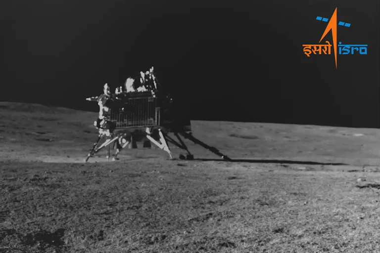 Chandrayaan-3 sits on the lunar surface, its robotic legs extended.