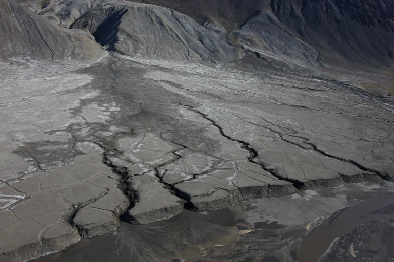 An ice field with channels cut through.