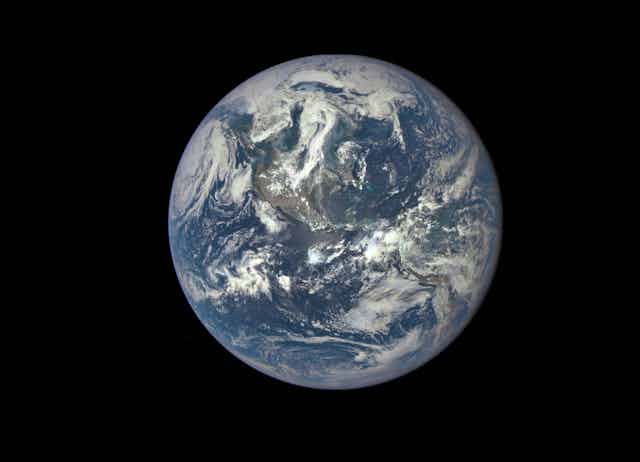 A whole Earth visible via satellite on a black background