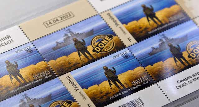A set of postage stamps depicting defiant Ukranian soldier giving a Russian ship the finger