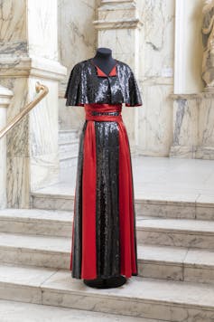 Black and red evening dress and cape