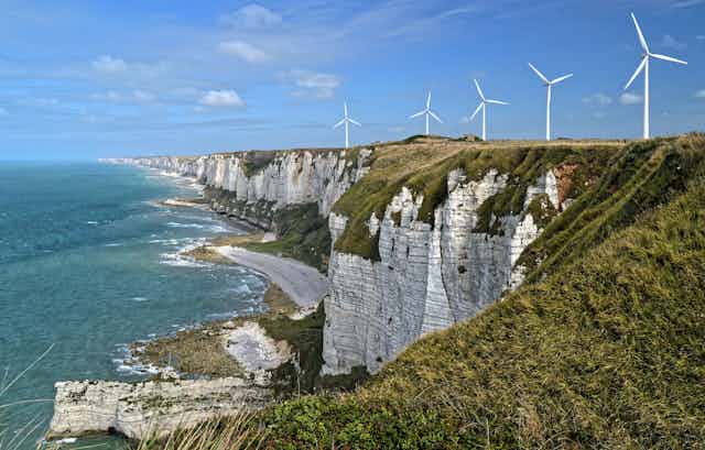 Wind turbins on a sea cliff. 