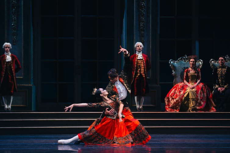 Production image: the Spanish dance in red.