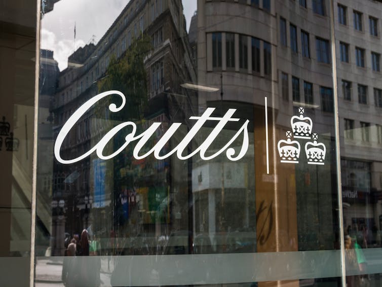 Window with Coutts sign and three crowns.