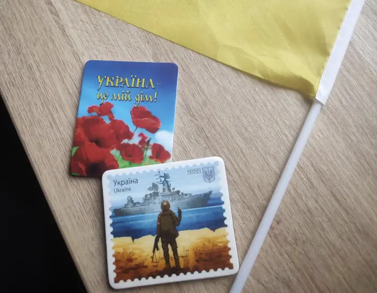 Two magnets and a Ukrainian flag.