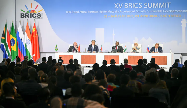 A group of world leaders on a stage