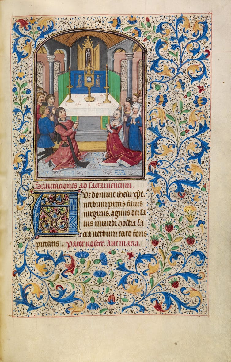 The original owner of this manuscript and his family kneel before an altar in adoration of the Eucharist, shown in an elaborate gold monstrance.