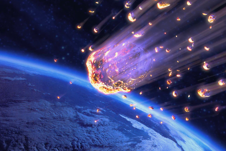Flaming rocks, shooting fiery trails behind them, hurtle towards the planet's surface