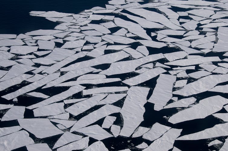 An aerial view of broken ice floes.