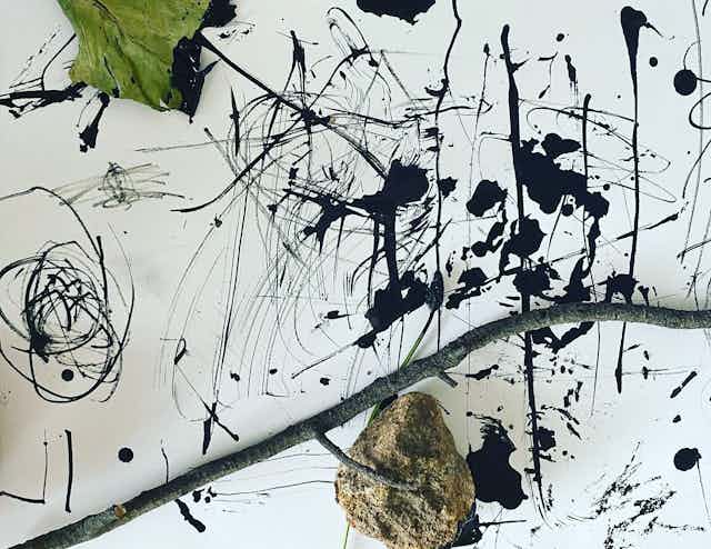 Sticks, leaves and ink on sheet of paper.