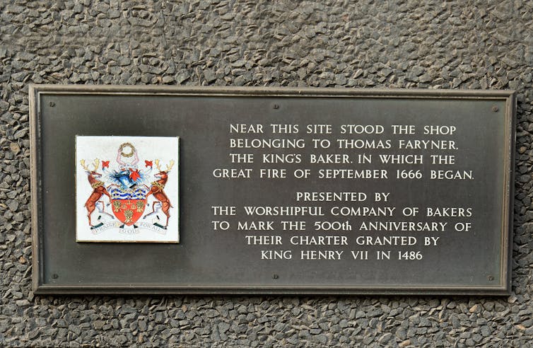A sign from the baker's guild marking the spot of the Pudding Lane bakery.