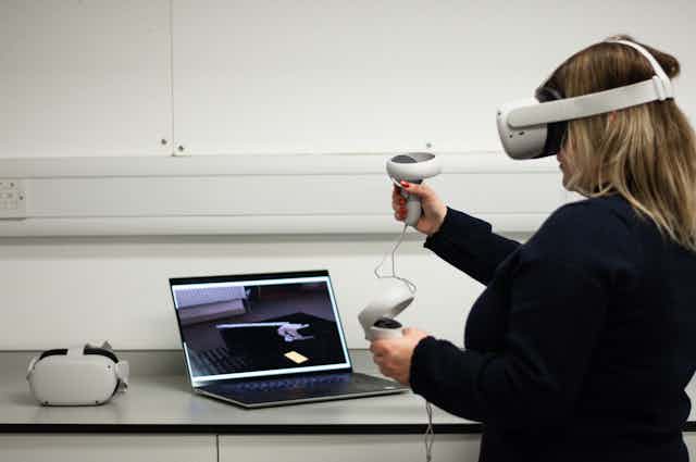 VR user in the Virtual Reality Lab, University of Winchester.