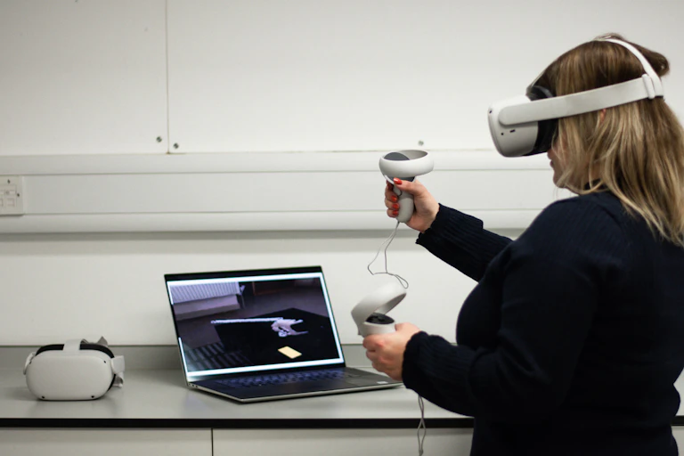 VR user in the Virtual Reality Lab, University of Winchester.